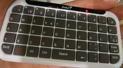 Small and cheap bluetooth keyboard Genius Mini Luxepad. Tested with OS Android.